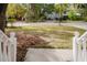 Spacious front yard with mature trees and a well-maintained lawn at 2422 Pristine View Rd, Charleston, SC 29414