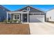 Gray house with white accents and a two-car garage at 280 W Bradford Pointe Dr, Summerville, SC 29486