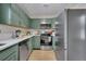 Newly renovated kitchen, featuring stainless steel appliances and green cabinets at 2829 Ranger Dr, North Charleston, SC 29405