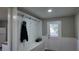 Bright entryway with built-in bench and storage at 412 Live Oak St, Walterboro, SC 29488
