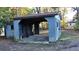 Detached garage with corrugated metal siding at 412 Live Oak St, Walterboro, SC 29488