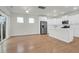 Modern kitchen with white cabinets, stainless steel appliances, and an island at 416 Brookgreen Dr, Moncks Corner, SC 29461