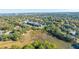 Aerial view of neighborhood, highlighting proximity to water and local amenities at 46 Chadwick Dr, Charleston, SC 29407
