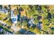Aerial image showing a neighborhood with houses of varying architectural styles at 46 Chadwick Dr, Charleston, SC 29407