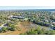 Neighborhood view showcasing waterfront property and autumn foliage at 46 Chadwick Dr, Charleston, SC 29407