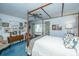 Bright bedroom featuring a four-poster bed, multiple framed pictures, and a ceiling fan at 46 Chadwick Dr, Charleston, SC 29407