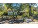 Back of house nestled amongst lush greenery at 46 Chadwick Dr, Charleston, SC 29407