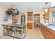 Retro kitchen with stainless steel countertops and open shelving at 46 Chadwick Dr, Charleston, SC 29407