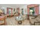 Spacious living room featuring hardwood floors, comfy seating, and large windows at 46 Chadwick Dr, Charleston, SC 29407