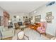Living area with hardwood floors, varied seating, and high ceilings at 46 Chadwick Dr, Charleston, SC 29407