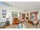 Living room with high ceilings, antique furniture, and large artwork at 46 Chadwick Dr, Charleston, SC 29407