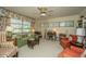 Relaxing sitting room with comfortable seating, a desk, and built-in bookshelves at 46 Chadwick Dr, Charleston, SC 29407