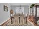 Formal dining room with hardwood floors and a large wooden table at 539 Pontoon Rd, Huger, SC 29450