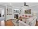 Living room with sectional sofa, fireplace, and built-in shelves at 539 Pontoon Rd, Huger, SC 29450