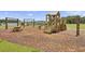 Enjoy this expansive playground with swings and play structures at 539 Pontoon Rd, Huger, SC 29450