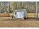 Detached storage shed with double doors at 539 Pontoon Rd, Huger, SC 29450