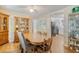 Dining room features wood table and chairs, hutch and hardwood floors at 614 Deepwood Ct, Moncks Corner, SC 29461