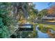 Serene canal view with private dock, ideal for boating enthusiasts at 1358 Hidden Lakes Dr, Mount Pleasant, SC 29464