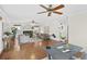 Bright living room with hardwood floors and a view into the kitchen at 1432 River Front Dr, Charleston, SC 29407