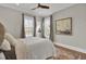 Spacious bedroom with ceiling fan and large windows at 149 Low Tide Ct, Charleston, SC 29492