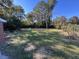 Spacious backyard with mature trees and grassy lawn at 200 Easy St, Goose Creek, SC 29445