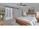 Main bedroom with sliding barn door and ensuite bathroom at 200 Nantucket Dr, Summerville, SC 29485