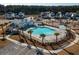 Community pool, clubhouse, and playground in a residential neighborhood at 215 Bering Ln, Summerville, SC 29486