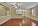 Hardwood floor living room with ceiling fan and neutral walls at 249 Austin Creek Ct, Summerville, SC 29483