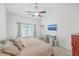 Main bedroom with king bed, large window, and lots of natural light at 271 Kelsey Blvd, Charleston, SC 29492