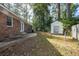 Brick house backyard with shed and patio at 301 Corey Blvd, Summerville, SC 29483