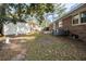 Brick home with a large backyard, detached shed, and patio at 301 Corey Blvd, Summerville, SC 29483
