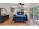 Bedroom with dresser, full bed, and backyard access at 301 Corey Blvd, Summerville, SC 29483
