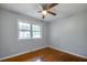 Charming bedroom with hardwood floors and ceiling fan at 301 Corey Blvd, Summerville, SC 29483