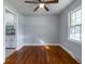 Empty dining room with hardwood floors and adjacent kitchen at 301 Corey Blvd, Summerville, SC 29483