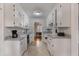 Kitchen with white cabinets, granite counters, and tile floor at 301 Corey Blvd, Summerville, SC 29483
