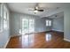 Living room featuring hardwood floors, and sliding glass doors to backyard at 301 Corey Blvd, Summerville, SC 29483