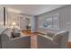 Living room with hardwood floors, neutral walls and large windows at 301 Corey Blvd, Summerville, SC 29483