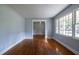 Bright living room with hardwood floors and large windows at 301 Corey Blvd, Summerville, SC 29483