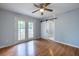 Bright living room with hardwood floors, french doors, and barn door at 301 Corey Blvd, Summerville, SC 29483