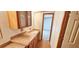 Clean bathroom with single vanity and access to bedroom at 3112 Santee River Rd, Saint Stephen, SC 29479