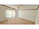 Bright bedroom featuring neutral walls and carpet flooring at 3112 Santee River Rd, Saint Stephen, SC 29479