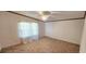 Bright bedroom with neutral walls and carpet flooring at 3112 Santee River Rd, Saint Stephen, SC 29479