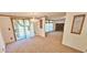 Open concept dining room with access to a patio and view of the living area at 3112 Santee River Rd, Saint Stephen, SC 29479