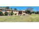 Ranch-style brick home with landscaped yard and spacious front porch at 3112 Santee River Rd, Saint Stephen, SC 29479
