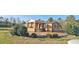 Brick home with covered porch and a landscaped yard at 3112 Santee River Rd, Saint Stephen, SC 29479