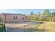 Home exterior with side yard and fence at 3112 Santee River Rd, Saint Stephen, SC 29479