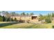 Brick home with covered porch and a landscaped yard at 3112 Santee River Rd, Saint Stephen, SC 29479