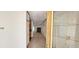 Home hallway with carpet and a view of the living room at 3112 Santee River Rd, Saint Stephen, SC 29479