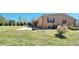 Ranch-style home with brick exterior and patio at 3112 Santee River Rd, Saint Stephen, SC 29479