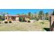 Brick ranch house with landscaped yard and fence at 3112 Santee River Rd, Saint Stephen, SC 29479